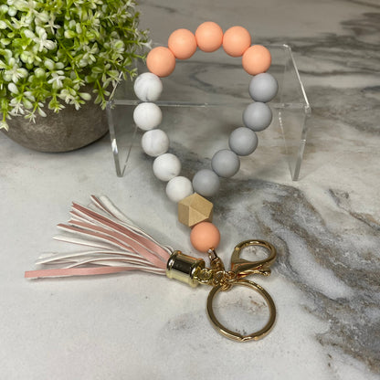 Silicone Bracelet Keychain with Wood Bead & Tassel - Orange Cream